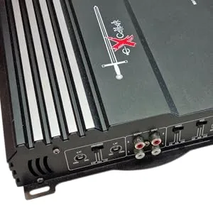 Black car amplifier unit with heat sink fins, multiple connection ports, and red logo detail.