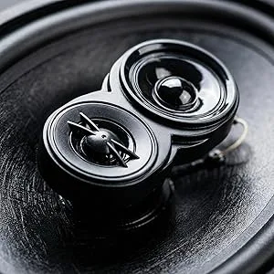 Dramatic black and white macro photographs showing close-up details of metallic surfaces and mechanical components.