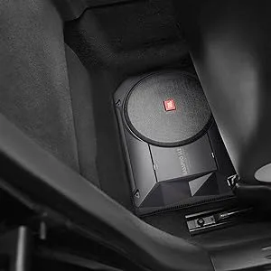 Multiple views of a black car speaker or audio device mounted on what appears to be a vehicle's interior ceiling or surface.