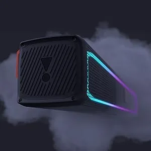 Gaming console or electronic device shown in dark setting with dramatic blue and purple LED lighting effects. Device appears to be matte black with angular design.