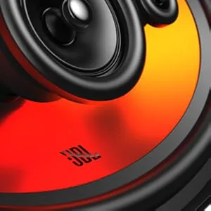 Close-up shots of a speaker or audio device, showing black cone against vibrant red and orange gradient background. Multiple angles highlight the speaker's construction.