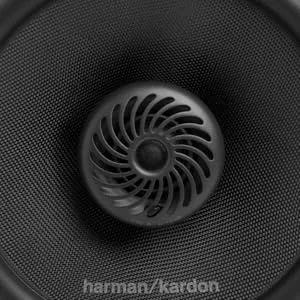 Text reads 'harman/kardon'. Black oval-shaped car speakers shown from different angles, featuring a spiral dome design in center.