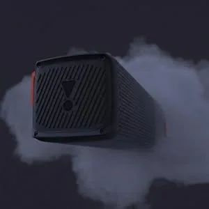 Donkere atmosferische productopnamen met een zwart elektronisch apparaat met geribbeld koelontwerp tegen een mistige achtergrond.