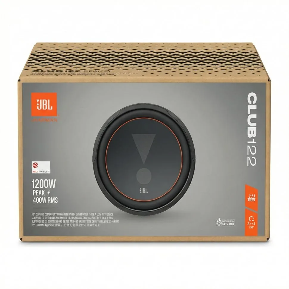 De tekst luidt 'JBL CLUB1224'. Productdoos met JBL-subwoofer in oranje en zwarte verpakking met zichtbare technische specificaties.