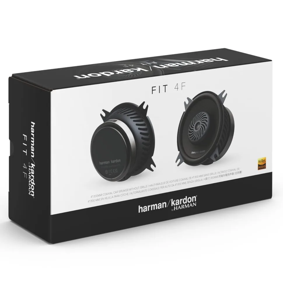 Zwart-wit productfoto van een doos met twee ronde luidspreker- of audiocomponenten tegen een donkere achtergrond.